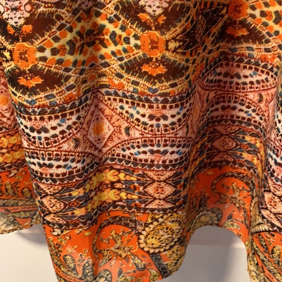 Orange, brown, and green patterned short dress - Picture 3 of 4